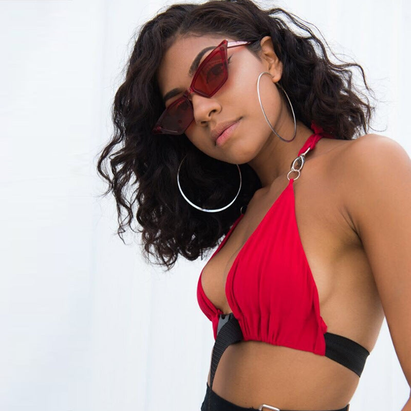 Short vest with hanging neck and exposed navel